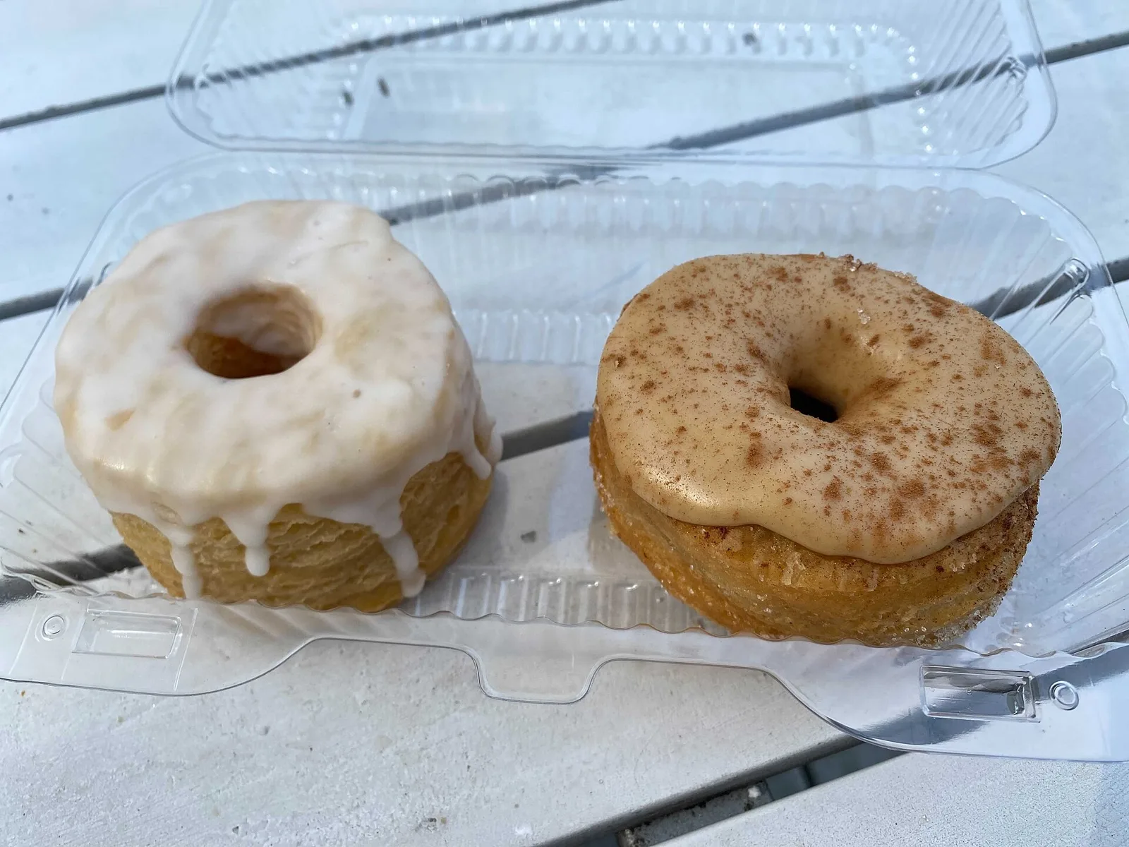 A vanilla-glazed doughnut and a maple-glazed doughnut from a bakery in Nashville, Tennessee.