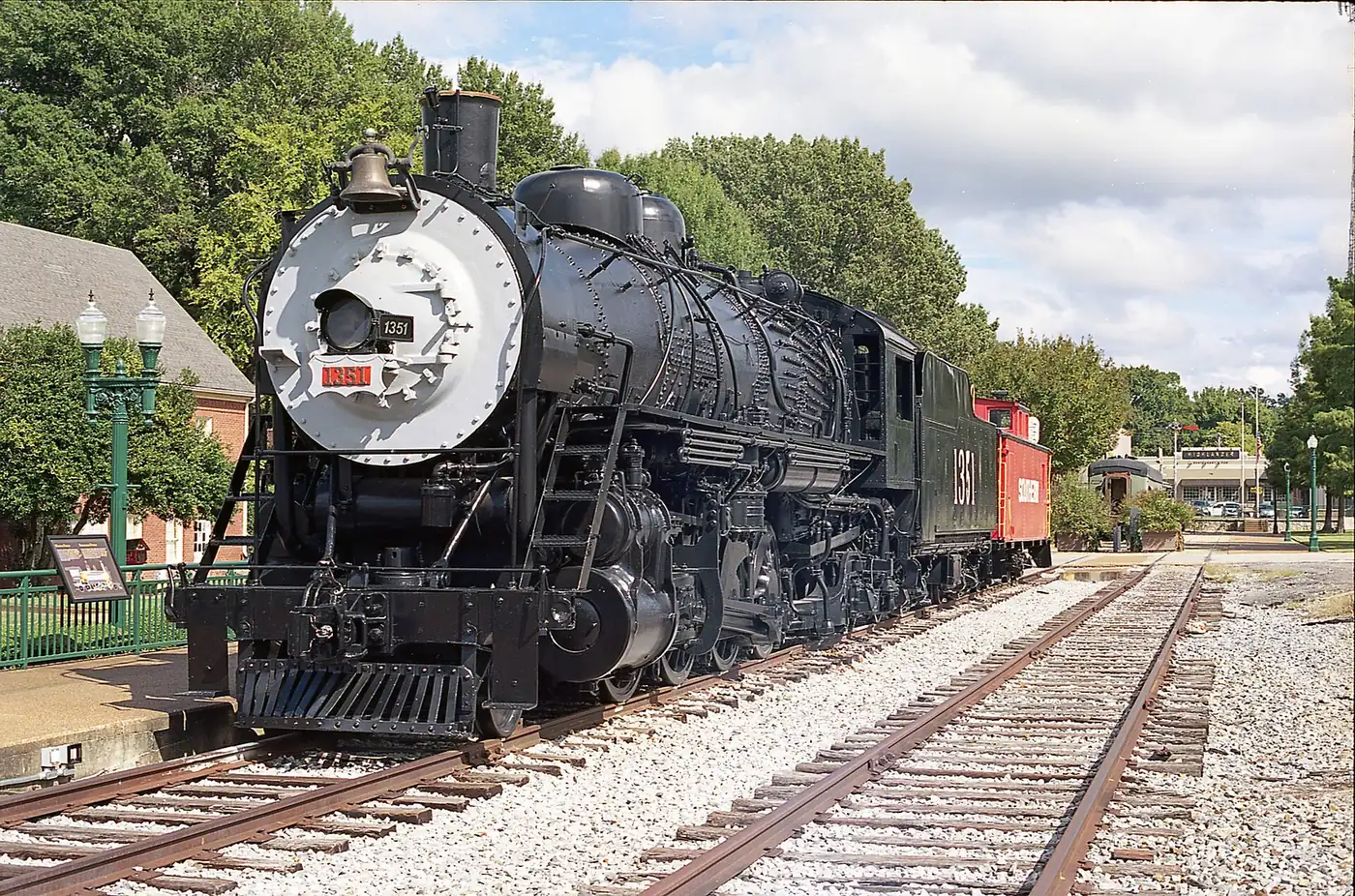 Steam locomotive Frisco 1351 on display by the tracks at the Collierville Town Square.