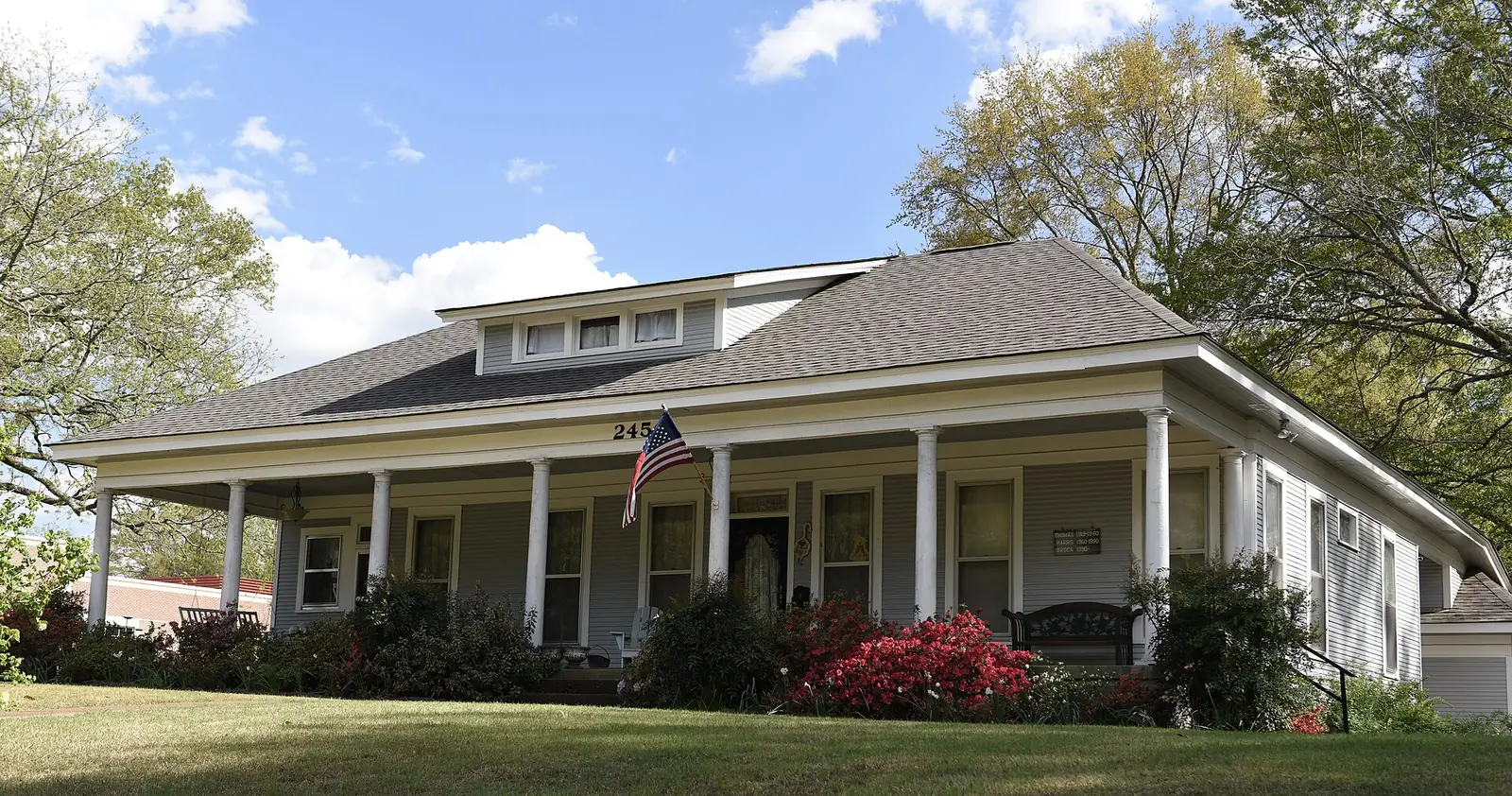 The John W. Thomas House, a one-story home with a deep porch and dormer, in Collierville.