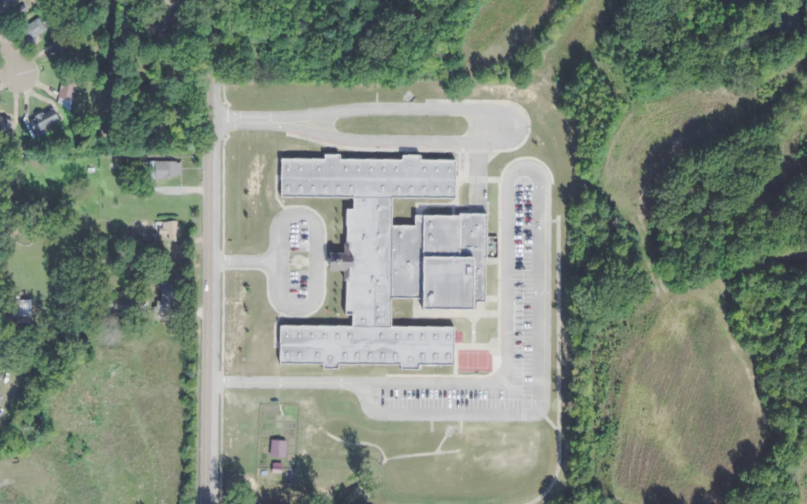 Collierville Middle School's building, parking lots and fields off Quinn Road in Collierville, seen from the air.