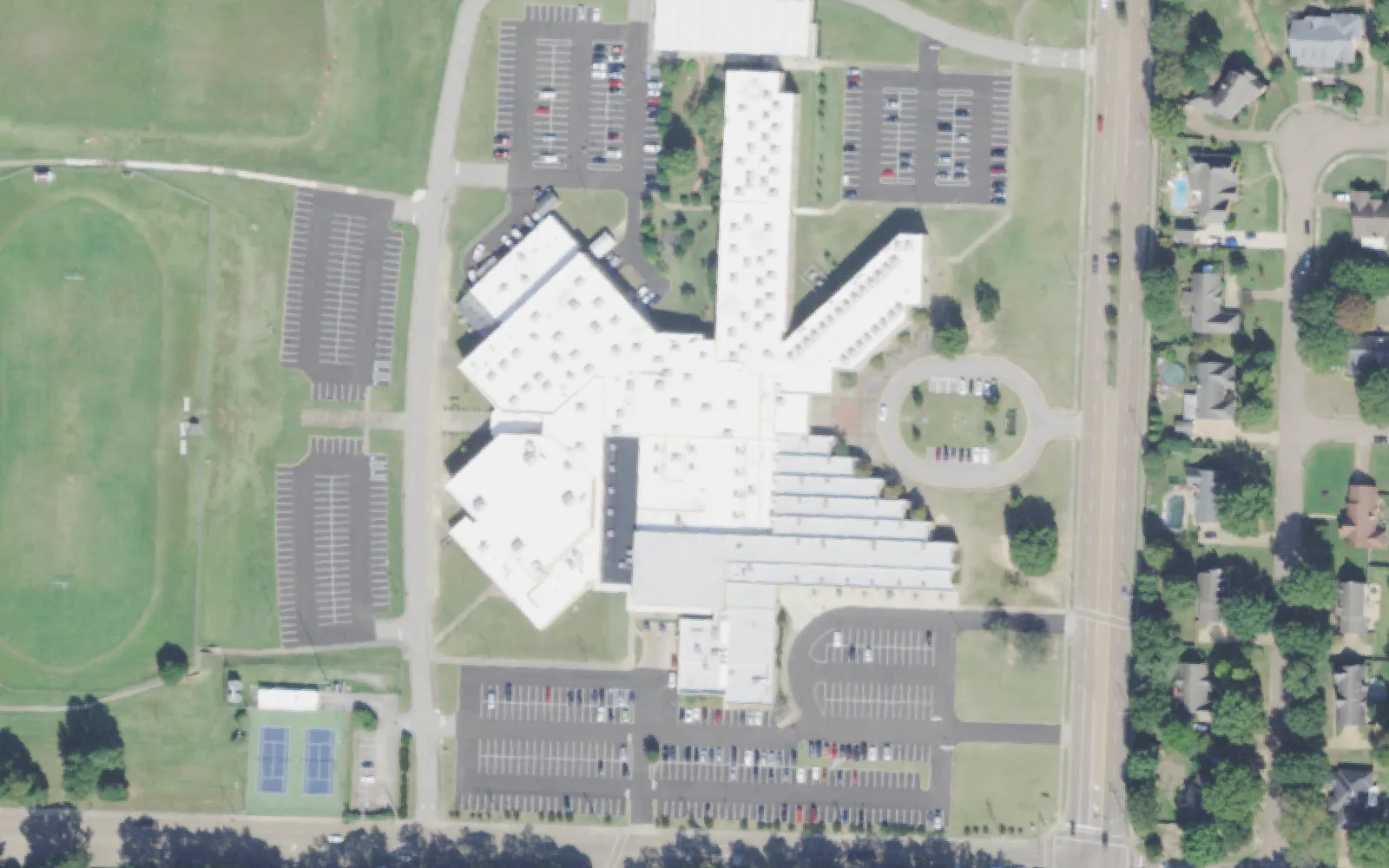 West Collierville Middle School's building, parking lots, tennis courts and playing fields off New Byhalia Road in Collierville, seen from the air.