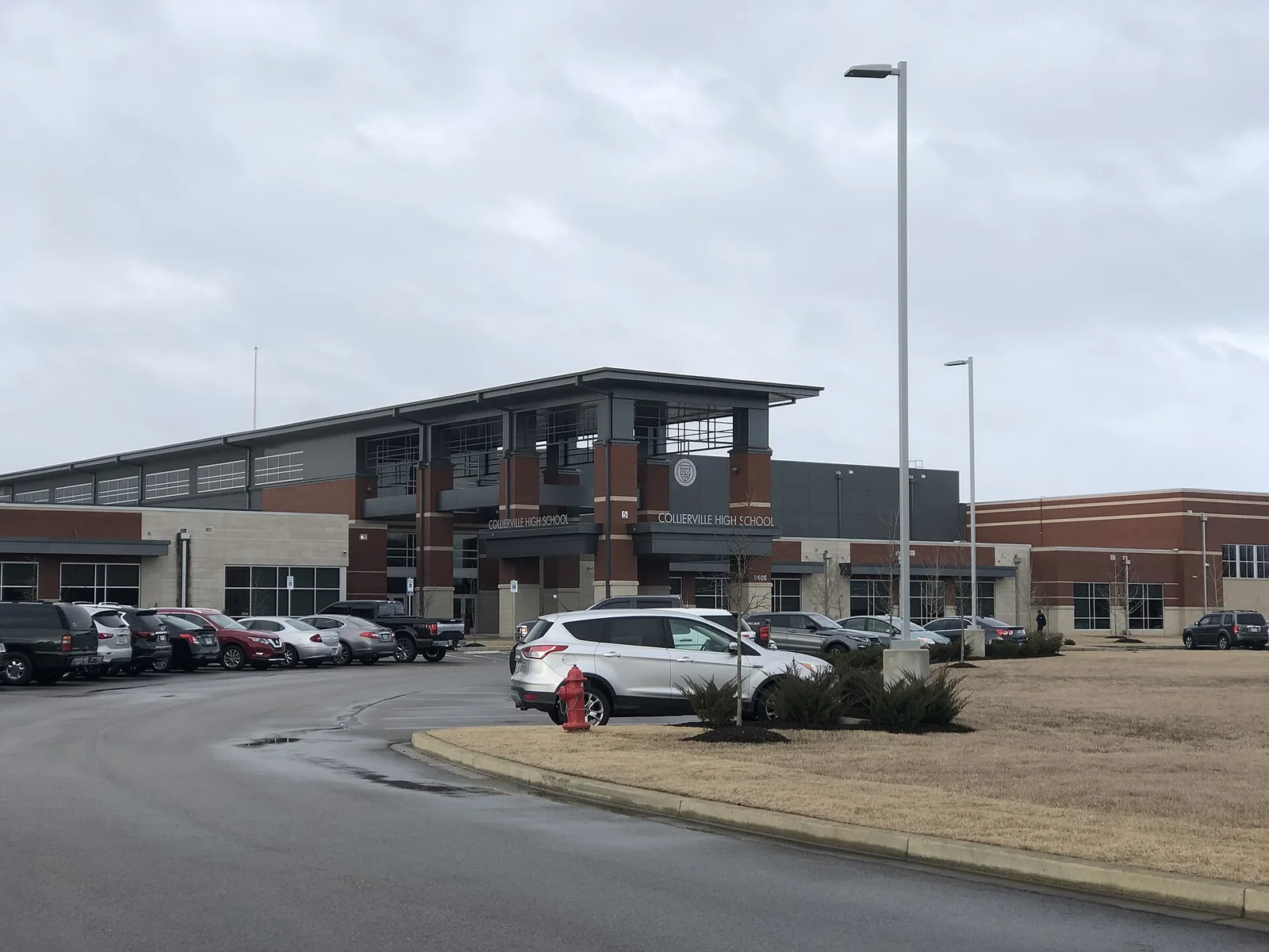 The front entrance and parking lot of Collierville High School.