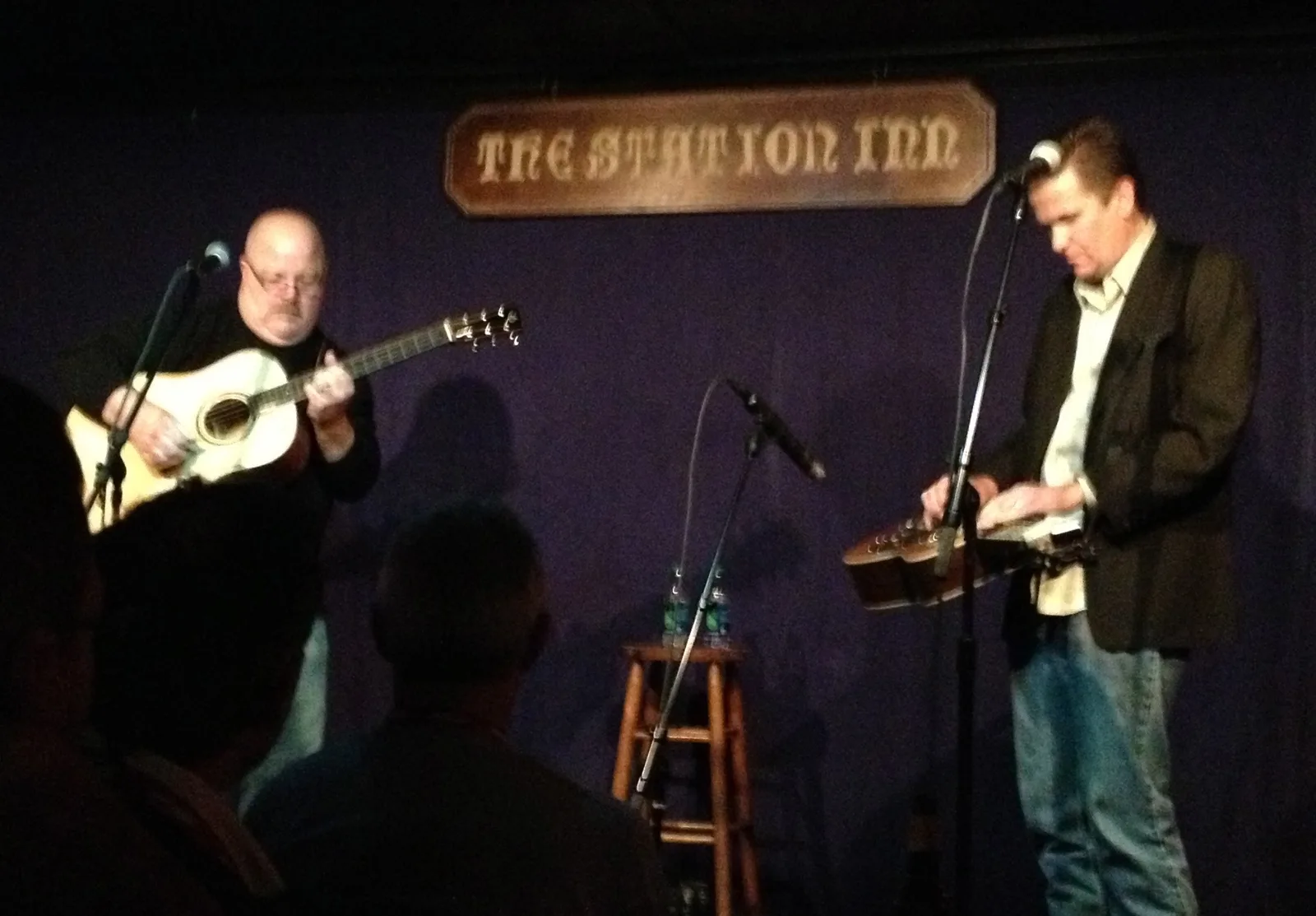 Jim Hurst, left, on guitar with Rob Ickes on resonator guitar at the Station Inn in Nashville; the Jim Hurst Band closed Sounds Like Collierville in 2026.