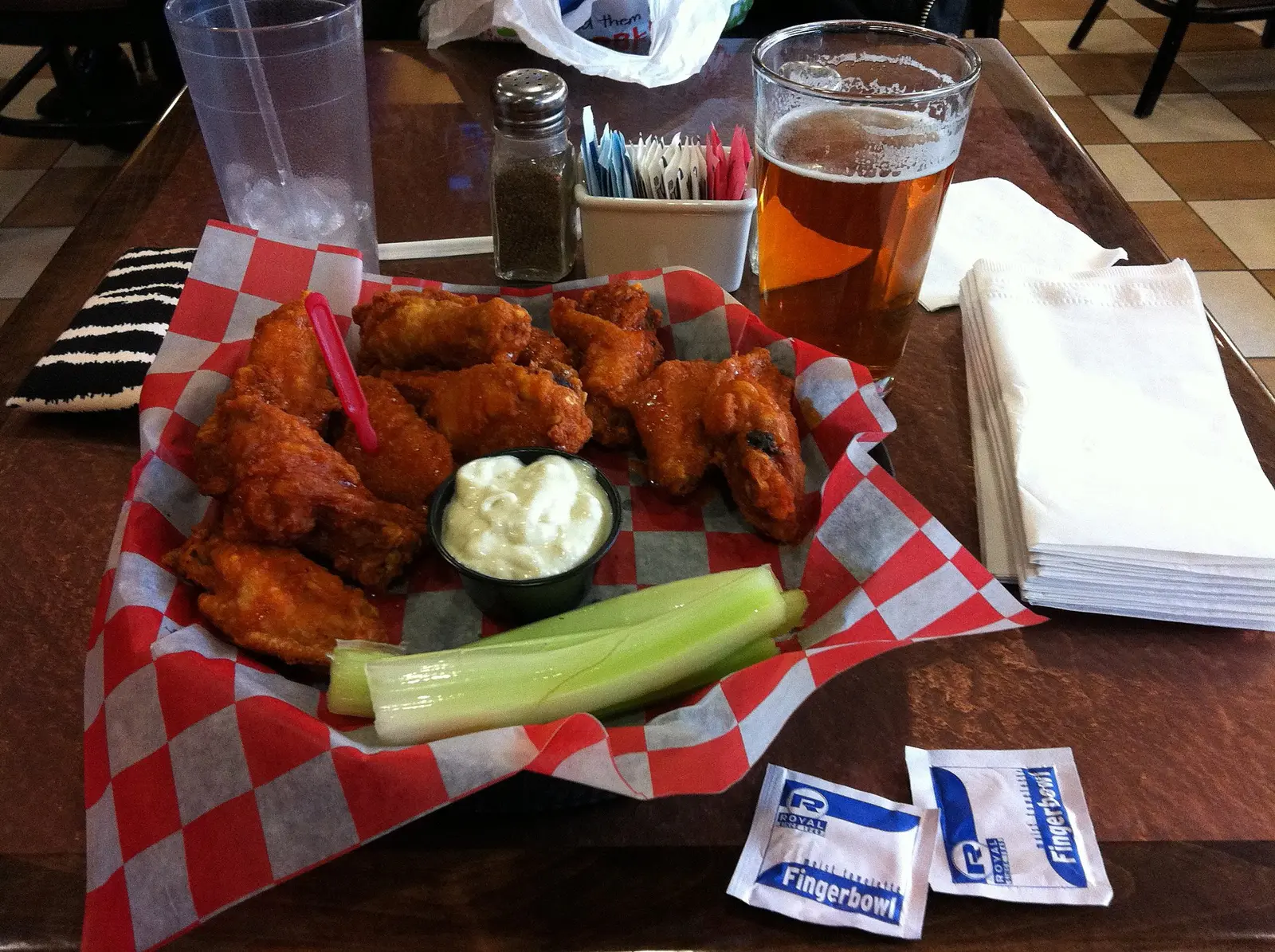 A basket of hot Buffalo wings with celery, served at the Anchor Bar in the Buffalo Niagara International Airport, New York.